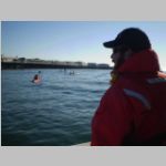 Crew member Chris Meyer stands port watch over the participants.jpg